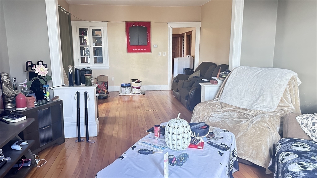 3 Bowker Street Worcester, MA 01604 - Photo 29 of 42 a living room with furniture and wooden floor