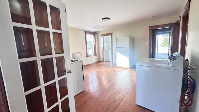 a view of livingroom with furniture and wooden floor