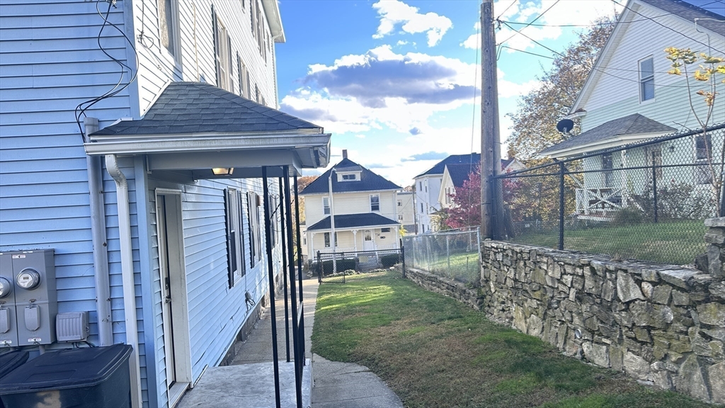 3 Bowker Street Worcester, MA 01604 - Photo 39 of 42 a front view of a house with garden