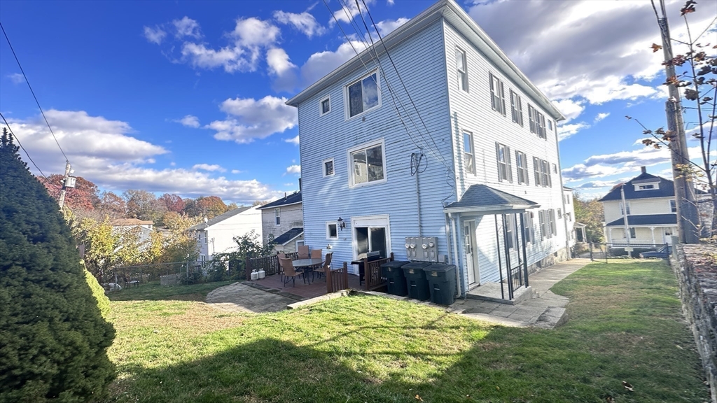 3 Bowker Street Worcester, MA 01604 - Photo 41 of 42 a view of a house with a yard porch and sitting area