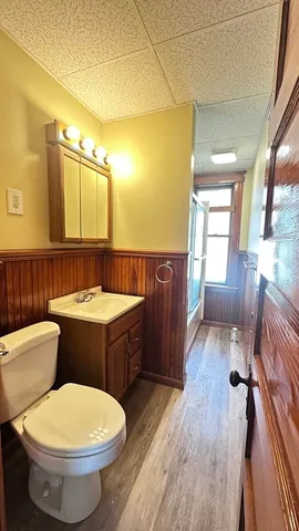a bathroom with a toilet a sink and a bathtub