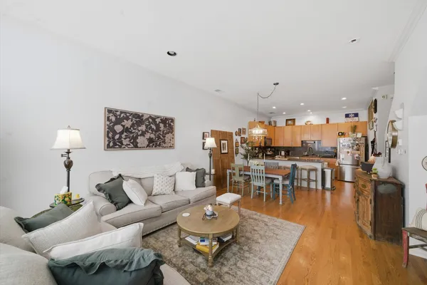 a living room with furniture and a table
