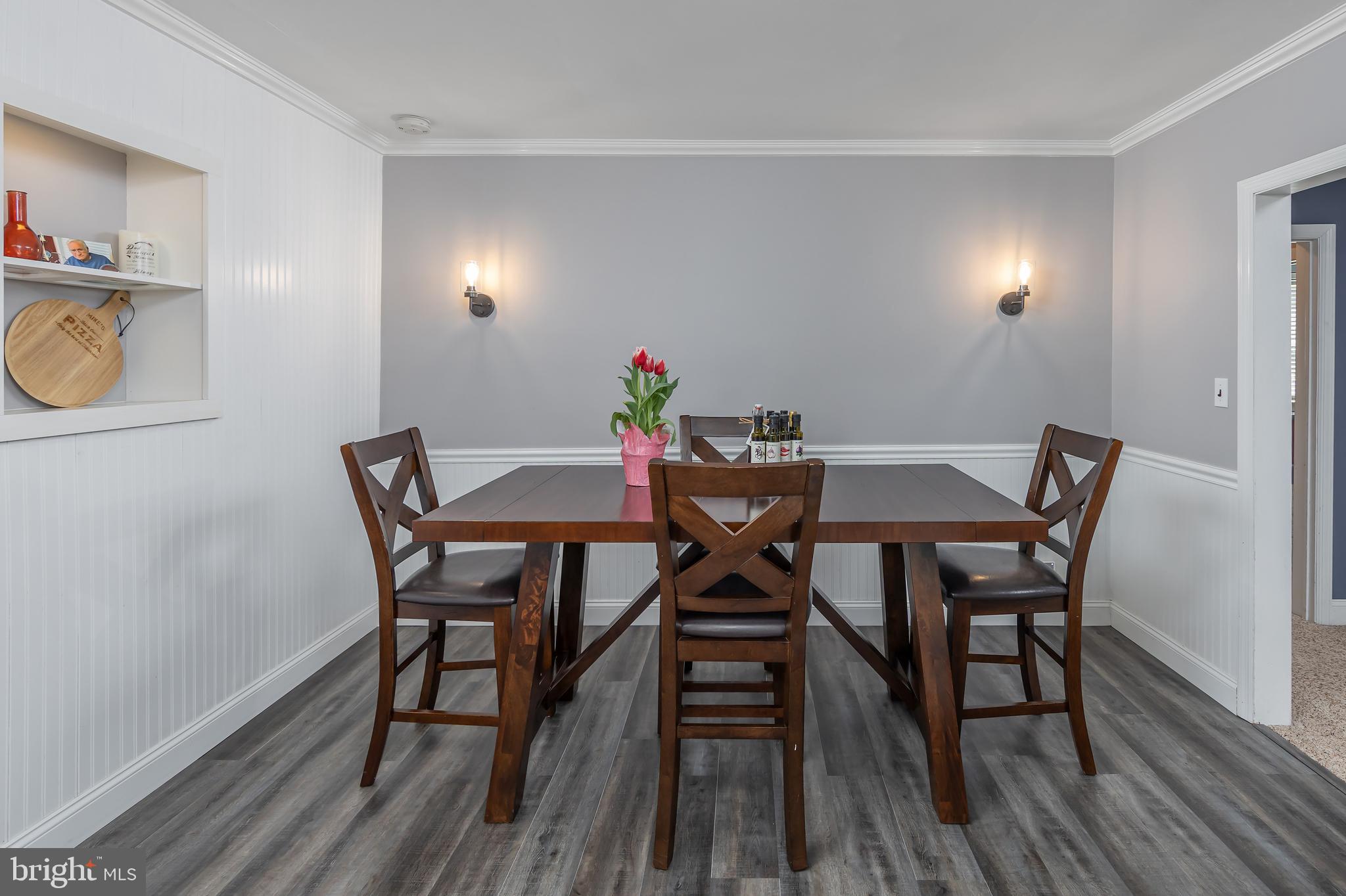 303 Main Street Mantua, NJ 08051 - Photo 9 of 50 a view of a dining room with furniture and wooden floor