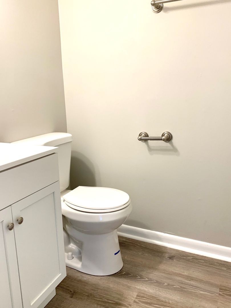 208 State Line Road Clarksville, TN 37042 - Photo 15 of 23 a bathroom with a toilet and a sink