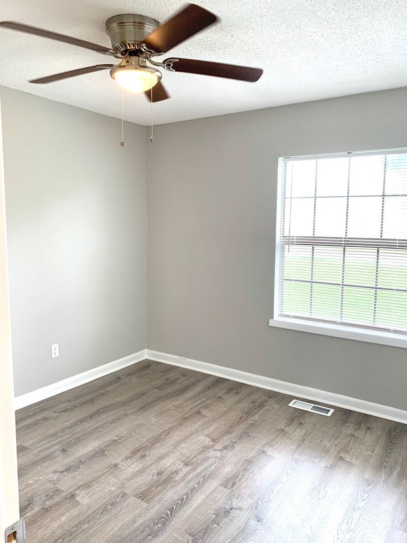 208 State Line Road Clarksville, TN 37042 - Photo 16 of 23 a view of an empty room with a window