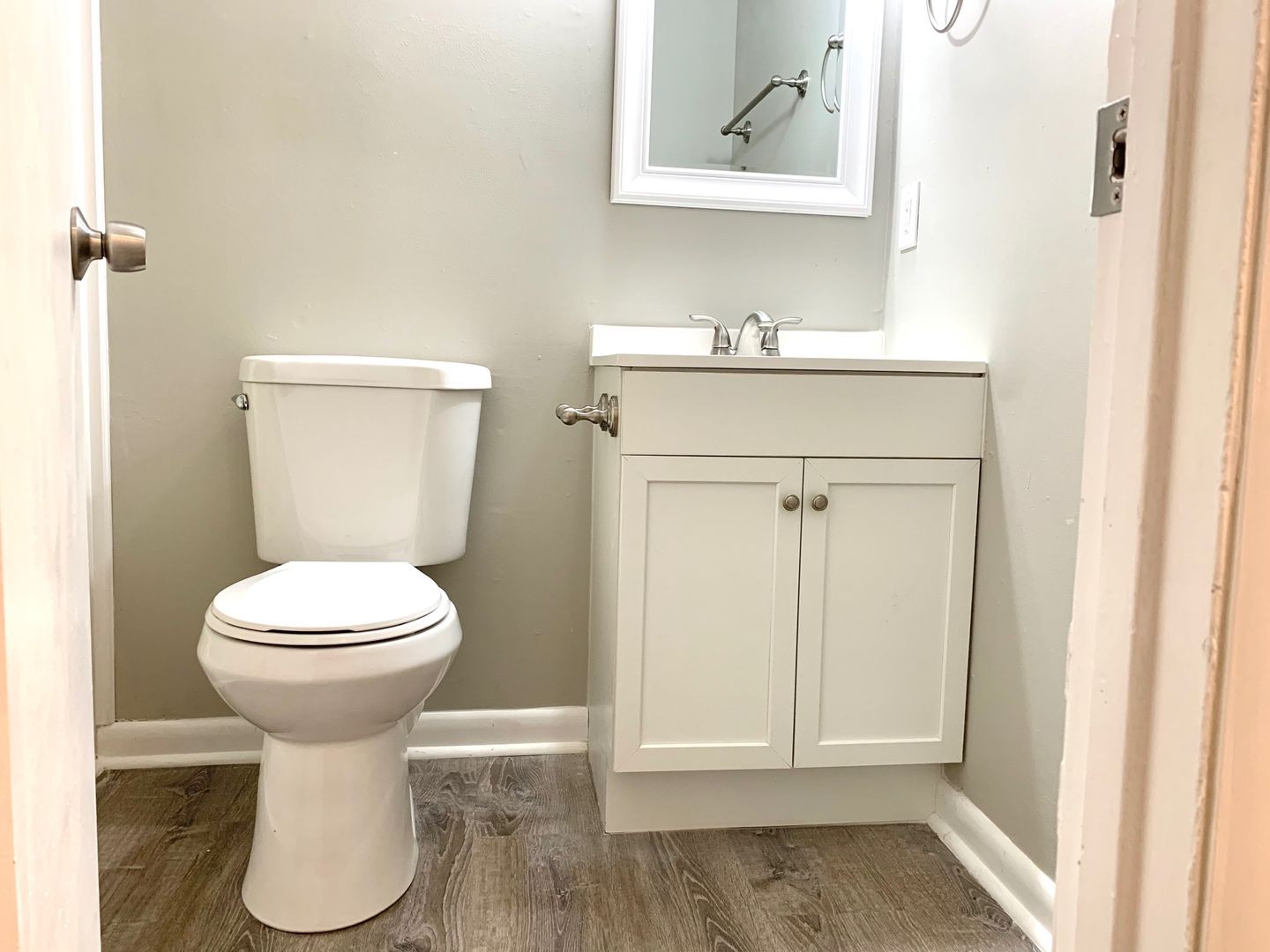 208 State Line Road Clarksville, TN 37042 - Photo 18 of 23 a bathroom with a toilet sink and mirror