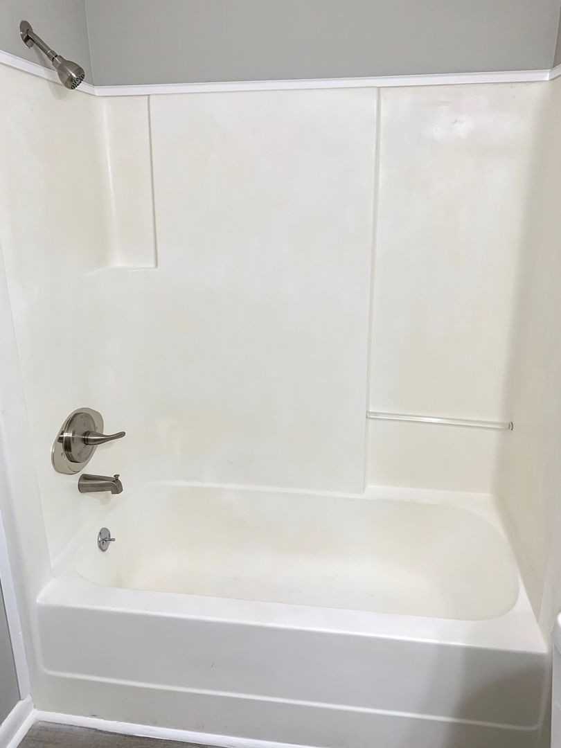 208 State Line Road Clarksville, TN 37042 - Photo 19 of 23 a bathroom with a bathtub