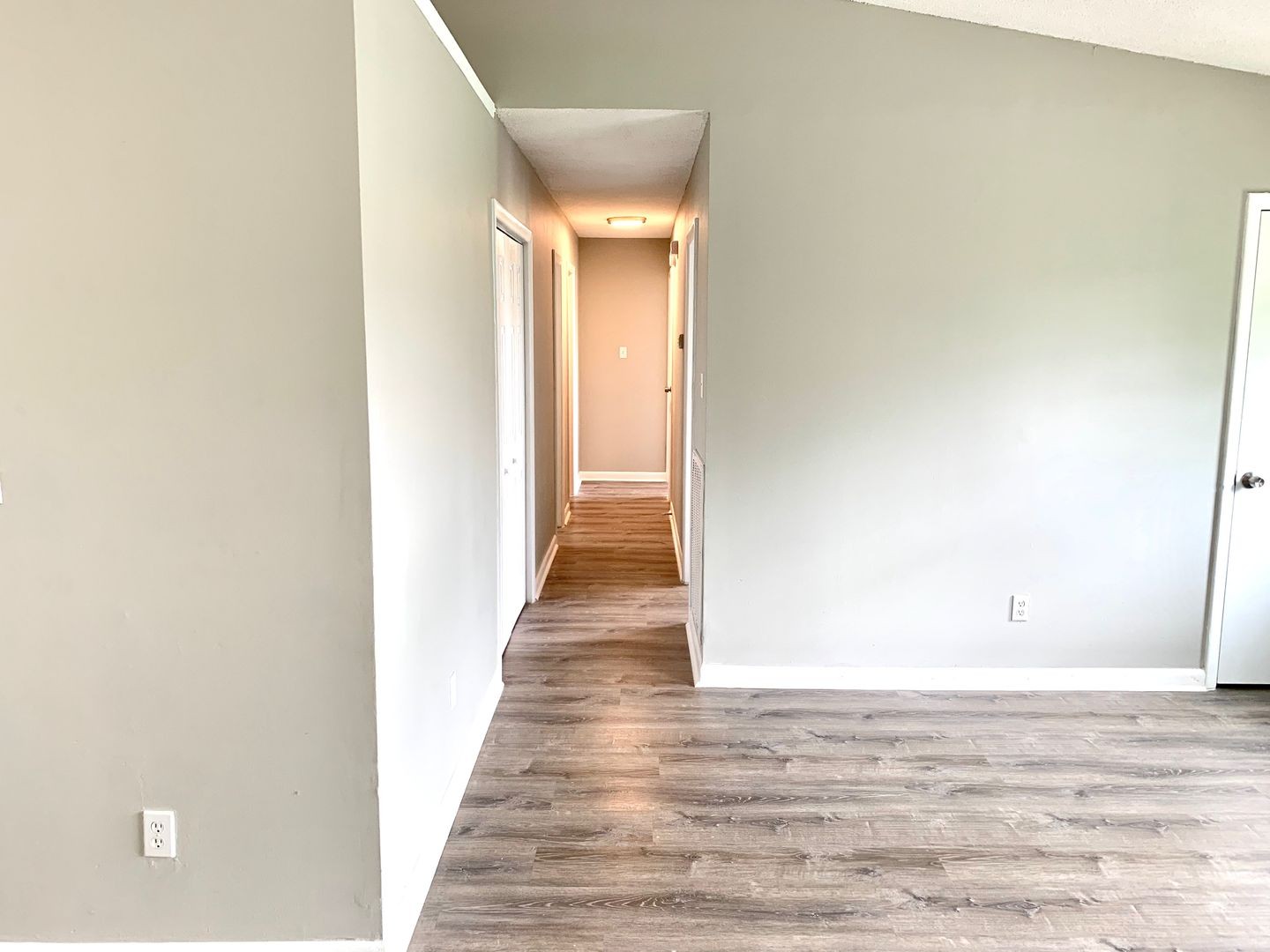 208 State Line Road Clarksville, TN 37042 - Photo 9 of 23 a view of a hallway with wooden floor