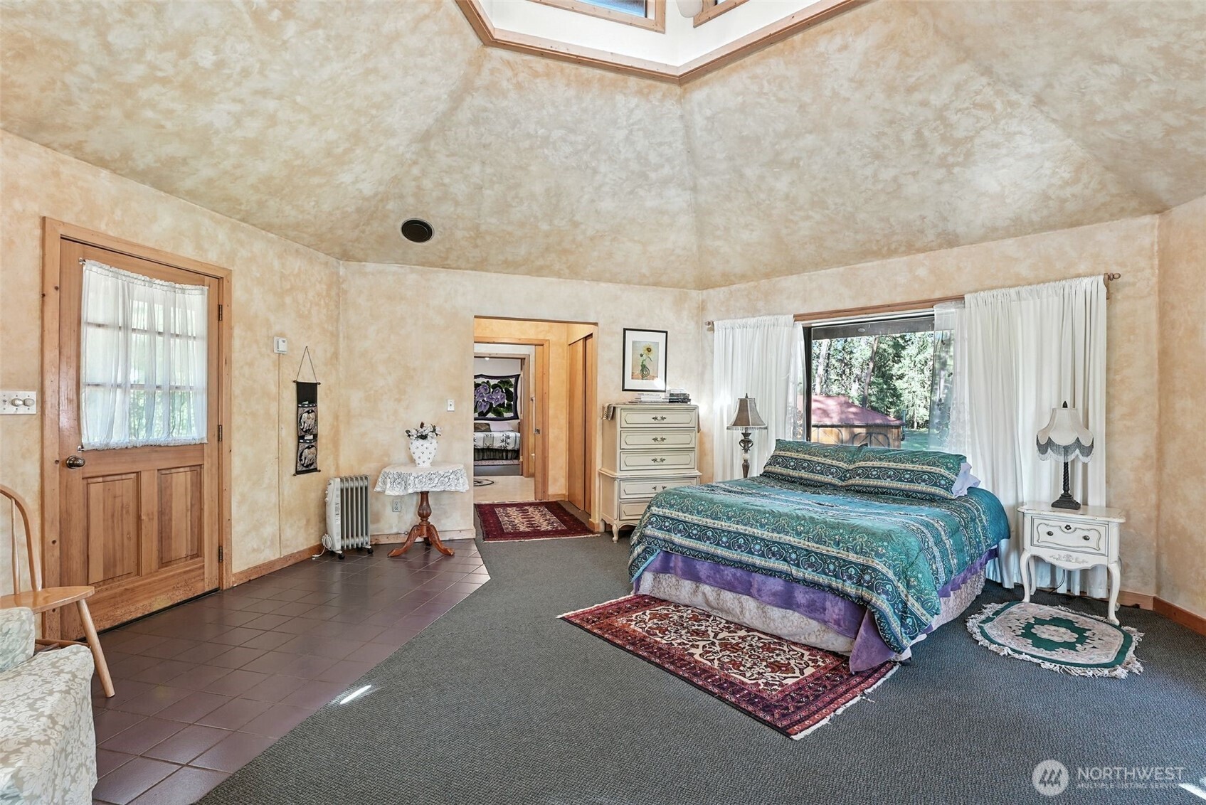3725 Vineyard Way Kettle Falls, WA 99141 - Photo 20 of 40 a bedroom with a bed and window