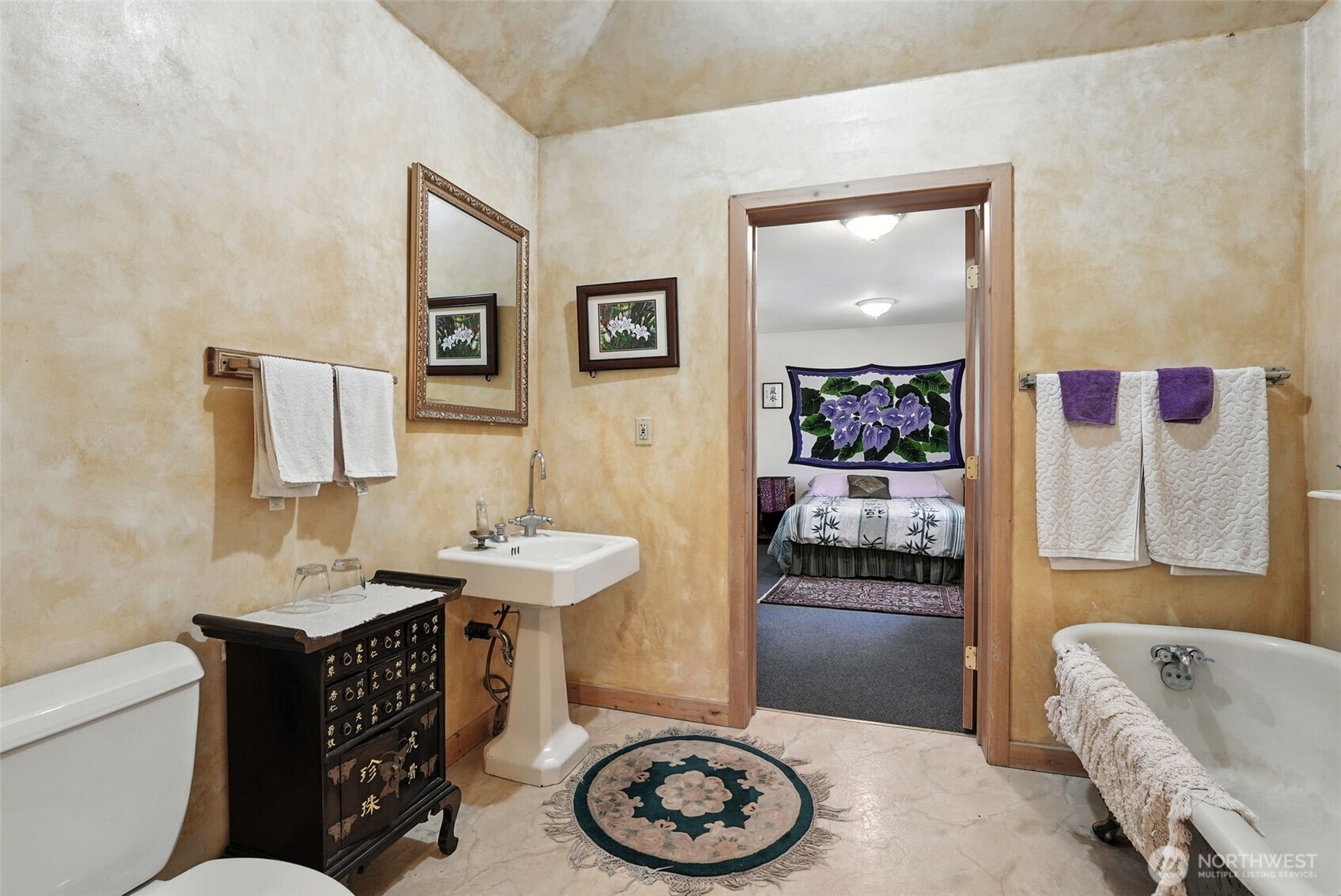 3725 Vineyard Way Kettle Falls, WA 99141 - Photo 21 of 40 a bathroom with a sink a toilet and shower
