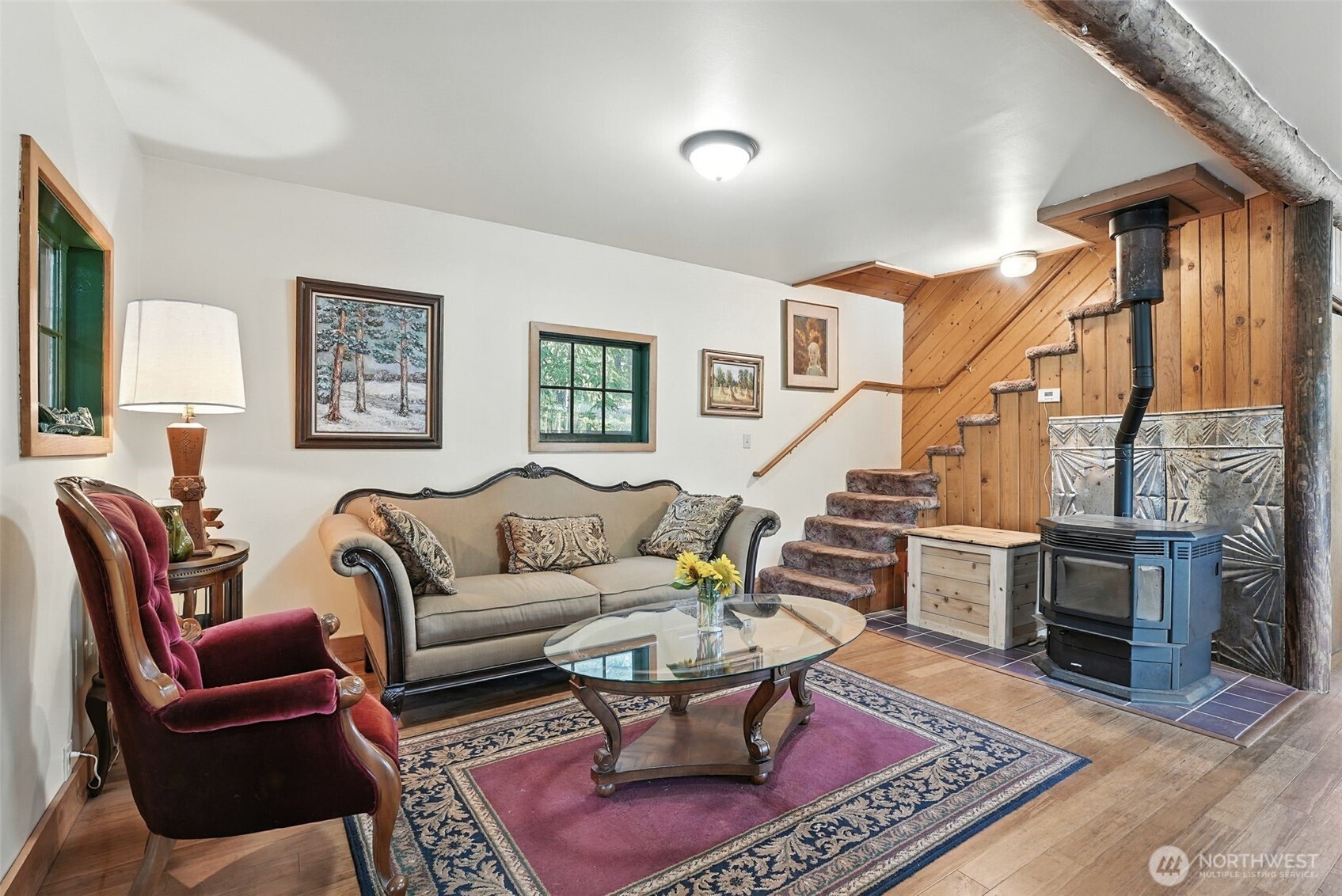 3725 Vineyard Way Kettle Falls, WA 99141 - Photo 4 of 40 a living room with furniture a rug and a fireplace