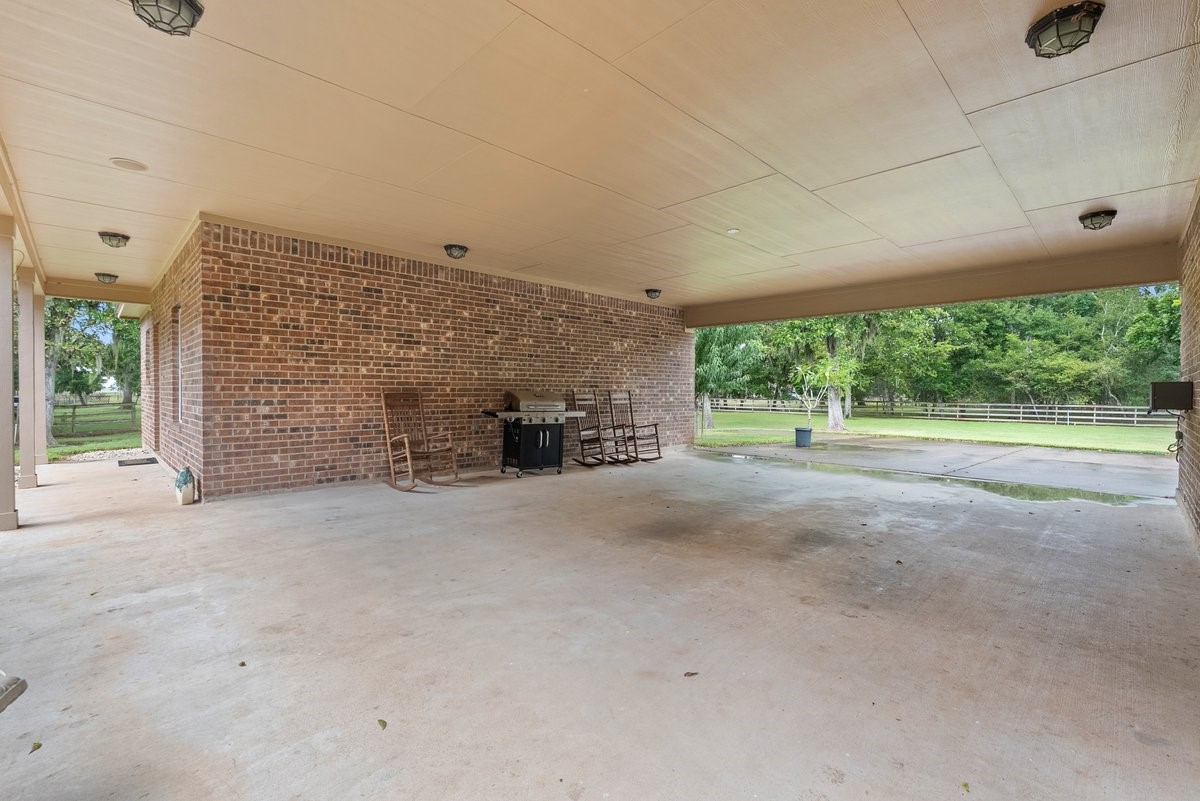 1303 China Grove Drive Rosharon, TX 77583 - Photo 28 of 42 Covered Carport area that leads to the Mother in law suite