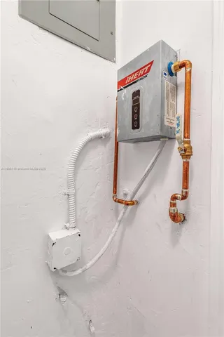 a bathroom with a sink and mirror