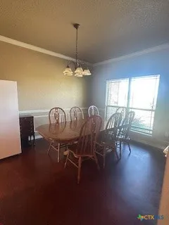 an empty room with windows and painted walls