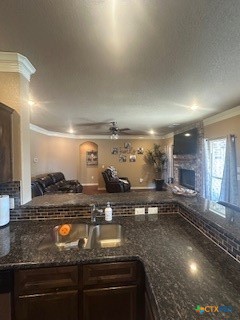 629 River Road Gatesville, TX 76528 - Photo 13 of 37 a kitchen with stainless steel appliances granite countertop a sink stove and cabinets
