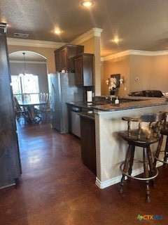 629 River Road Gatesville, TX 76528 - Photo 14 of 37 a kitchen with a sink a stove a refrigerator and chairs