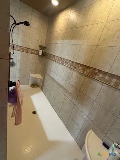 a workspace with furniture and a window