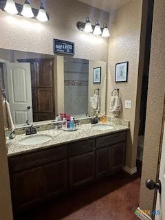 a view of a house with large windows and wooden fence