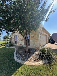 629 River Road Gatesville, TX 76528 - Photo 4 of 37 a front view of a house with garden