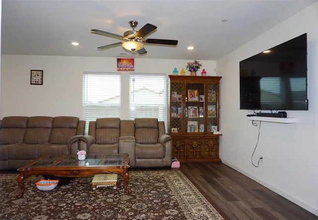 a kitchen with stainless steel appliances a refrigerator and microwave