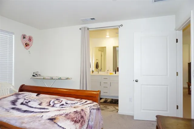 a view of a hallway with a wooden floor
