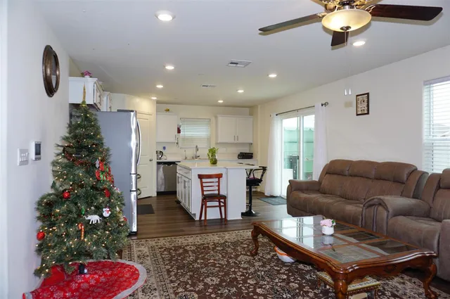 a view of a livingroom with furniture and a rug