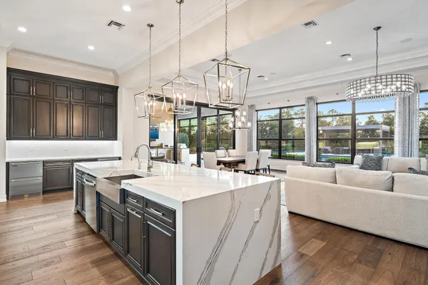 a kitchen with a refrigerator and a window
