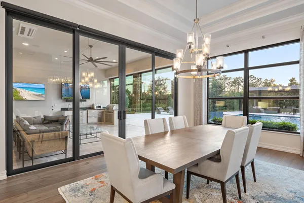 a view of a hallway view with wooden floor and staircase