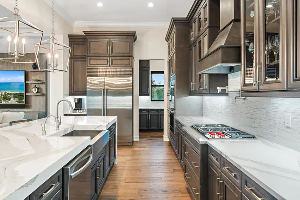 a view of a dining room with furniture large window and wooden floor