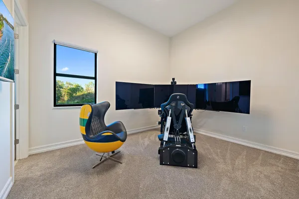 a room with lots of stuff and furniture