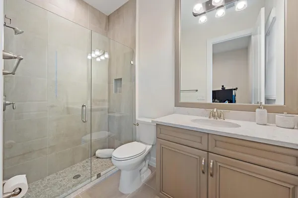 a view of a house with swimming pool and sitting area