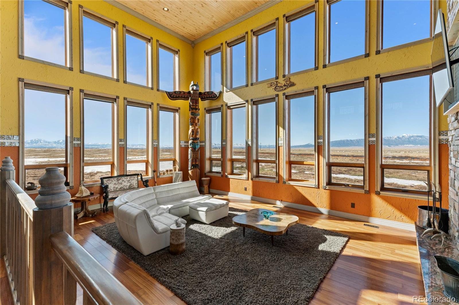 731 County Road 121 Walsenburg, CO 81089 - Photo 11 of 50 a very nice looking living room with furniture and floor to ceiling windows