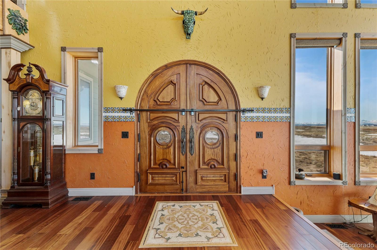 731 County Road 121 Walsenburg, CO 81089 - Photo 14 of 50 a view of front door with wooden floor