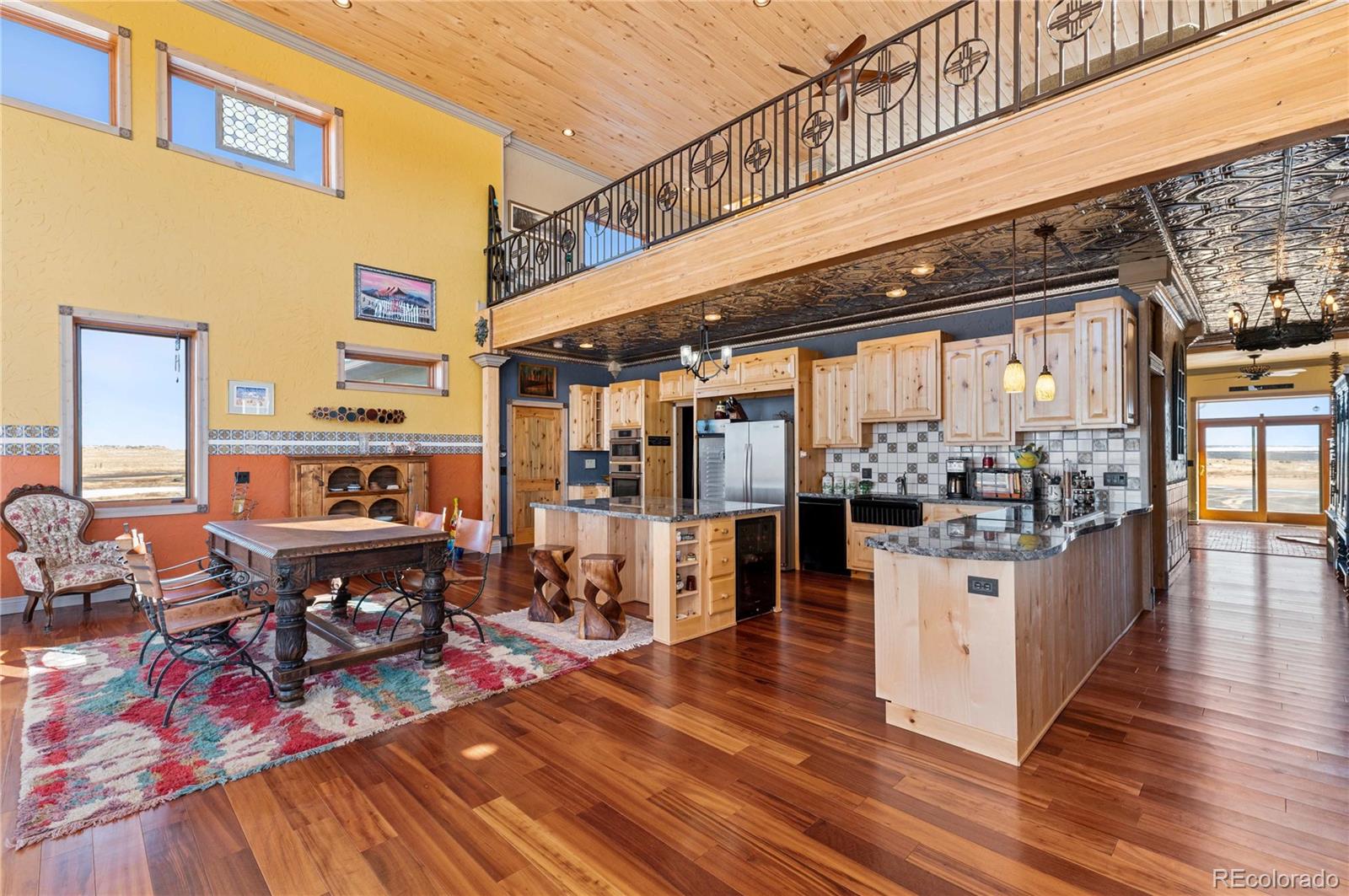 731 County Road 121 Walsenburg, CO 81089 - Photo 18 of 50 a outdoor living space with furniture and wooden floor