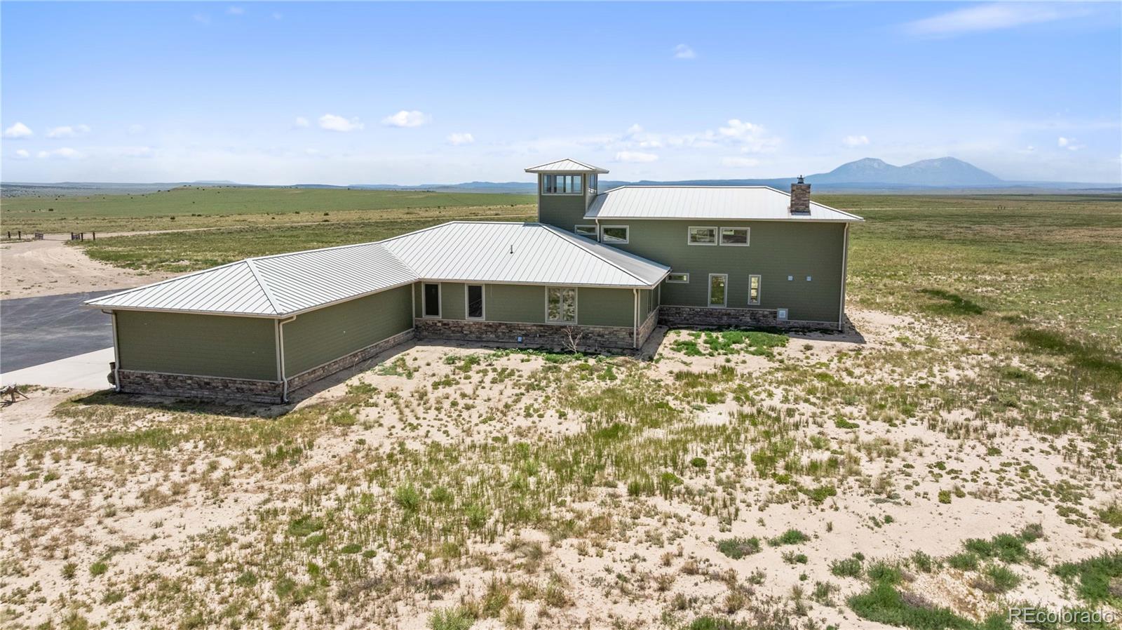 731 County Road 121 Walsenburg, CO 81089 - Photo 3 of 50 a view of a terrace with a lake