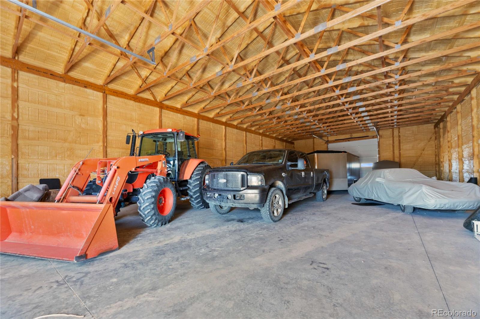 731 County Road 121 Walsenburg, CO 81089 - Photo 48 of 50 a view of parking garage with cars