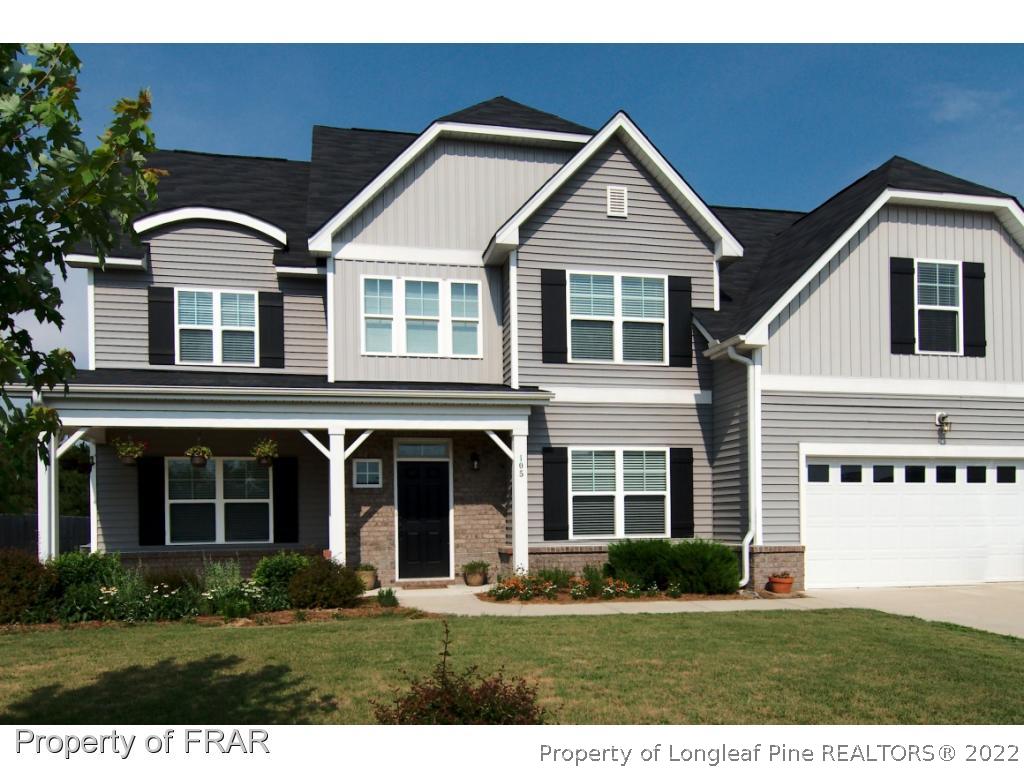 105 Caulfield Road Aberdeen, NC 28315 - Photo 1 of 36 a front view of a house with a yard