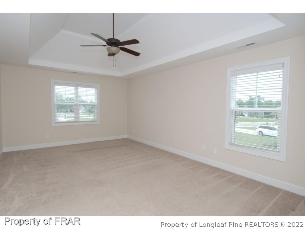 105 Caulfield Road Aberdeen, NC 28315 - Photo 18 of 36 a view of an empty room with a window