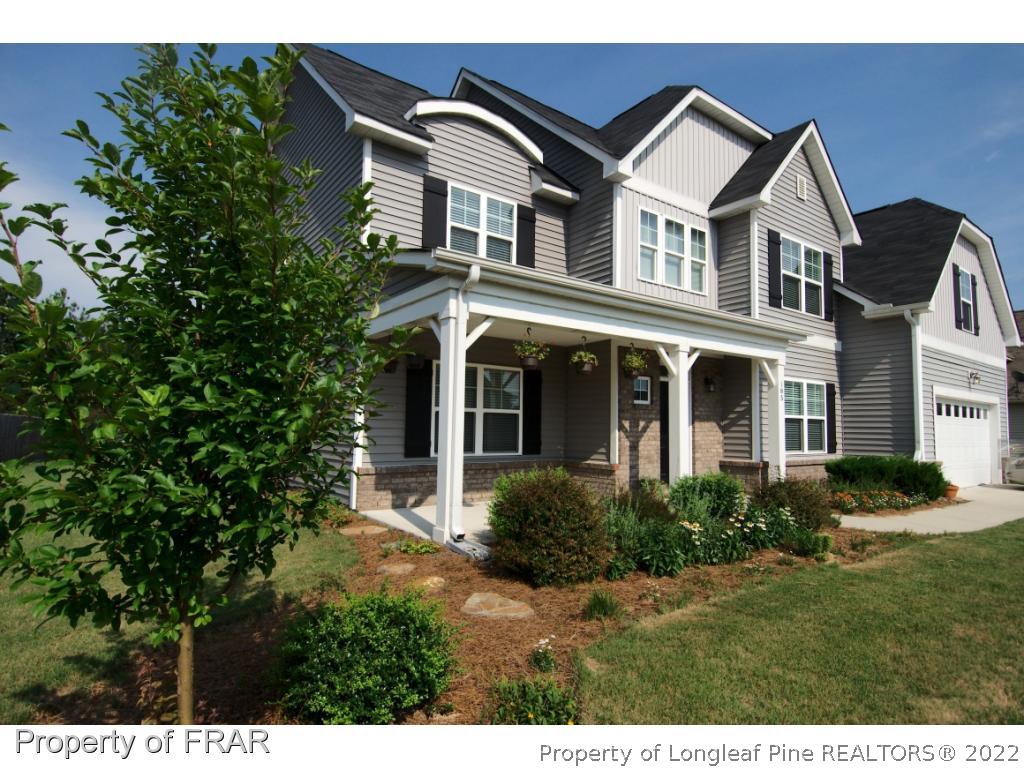 105 Caulfield Road Aberdeen, NC 28315 - Photo 2 of 36 a front view of a house with a yard