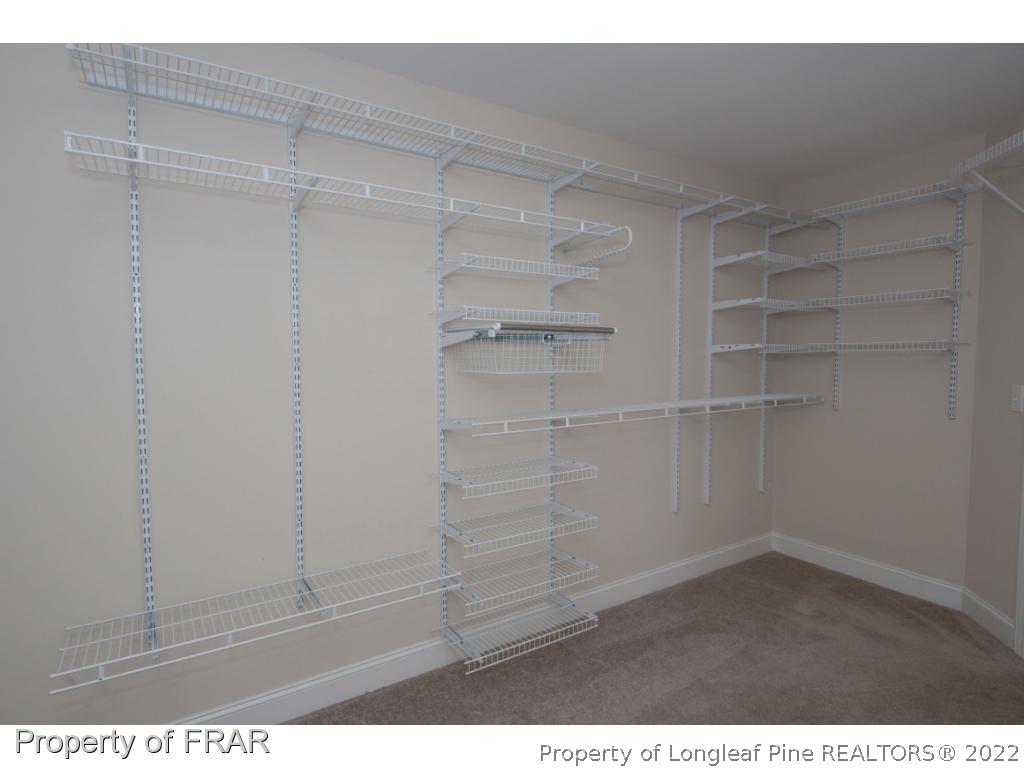 105 Caulfield Road Aberdeen, NC 28315 - Photo 24 of 36 a view of an empty walk in closet