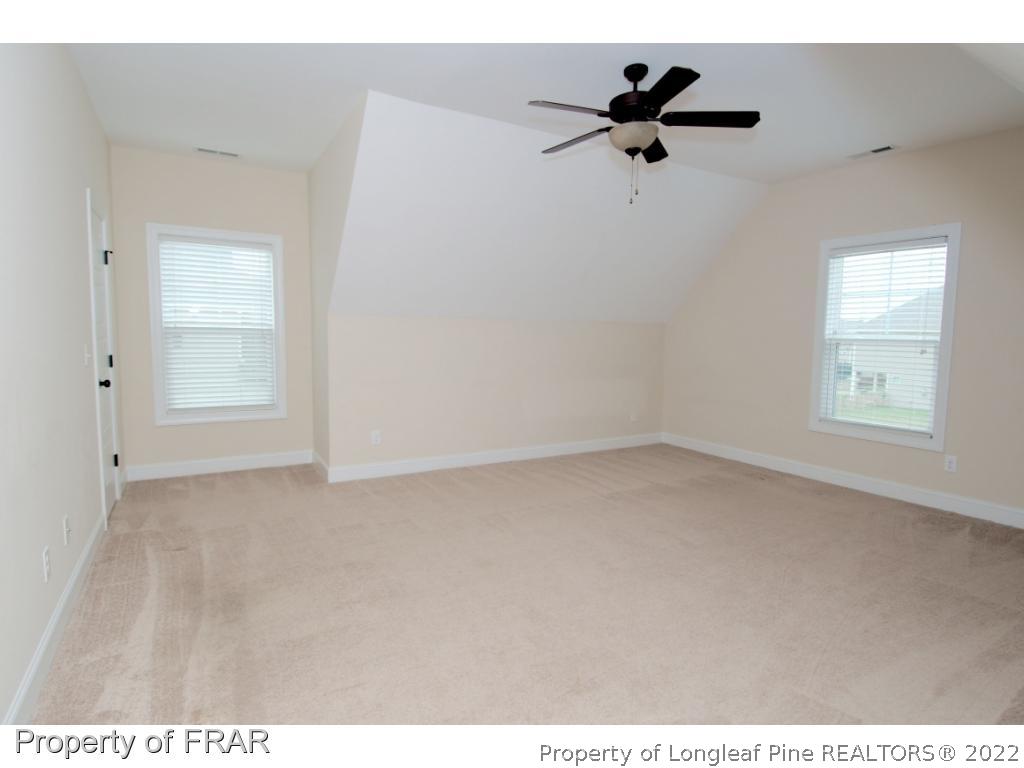 105 Caulfield Road Aberdeen, NC 28315 - Photo 29 of 36 a view of empty room with ceiling fan
