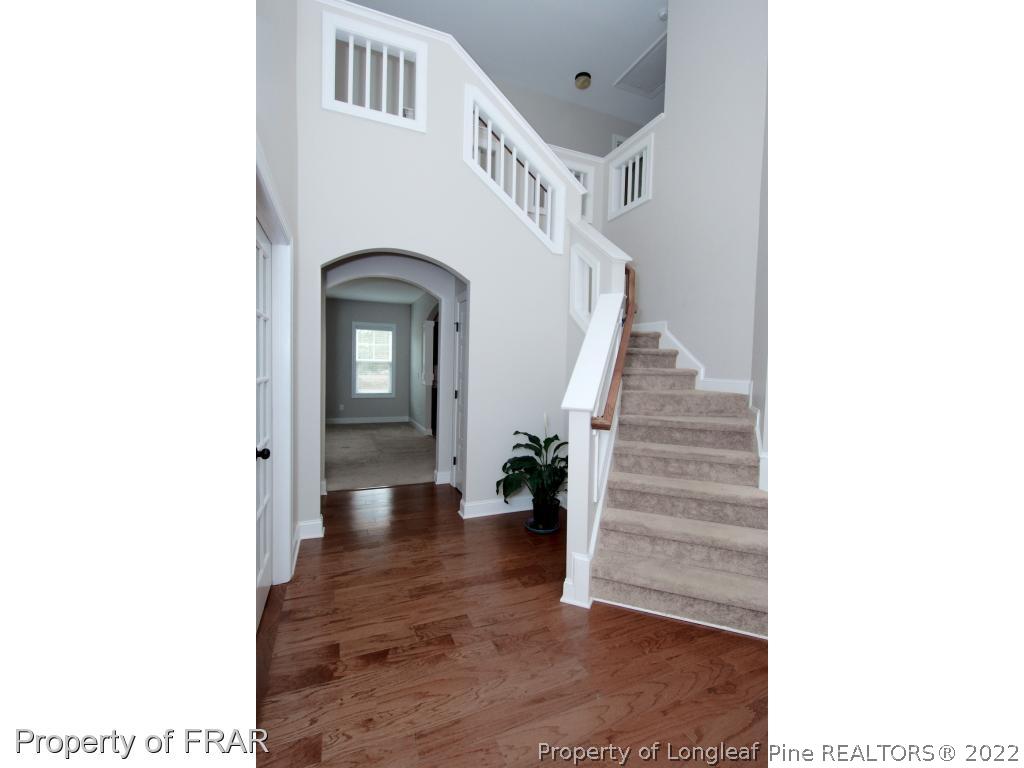 105 Caulfield Road Aberdeen, NC 28315 - Photo 3 of 36 a view of entryway and hall with wooden floor