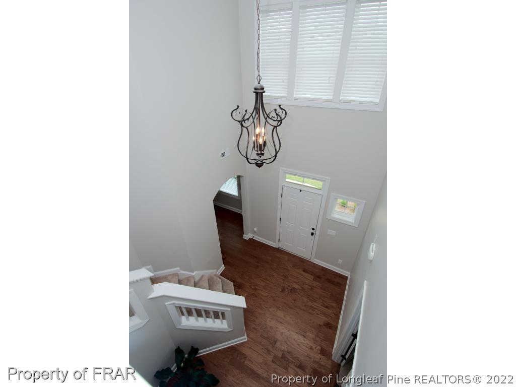 105 Caulfield Road Aberdeen, NC 28315 - Photo 4 of 36 a bathroom with a toilet and a sink