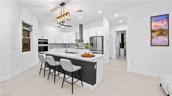 $665,000 | 569 Desoto Boulevard South, Naples, FL 34117