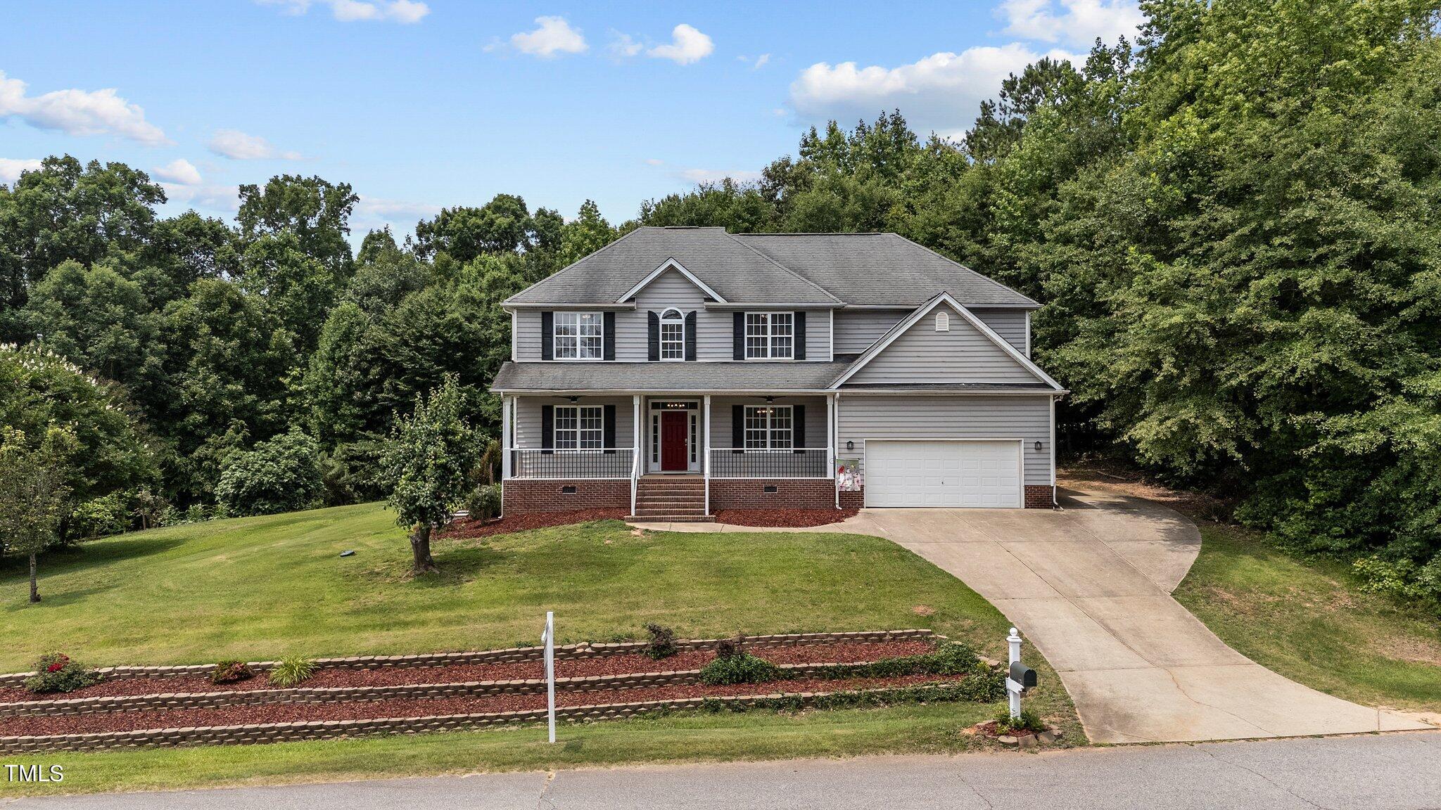 1236 Magnolia Hill Road Garner, NC 27529 - Photo 2 of 56 12-web-or-mls-DJI_20240606122319_0869_D