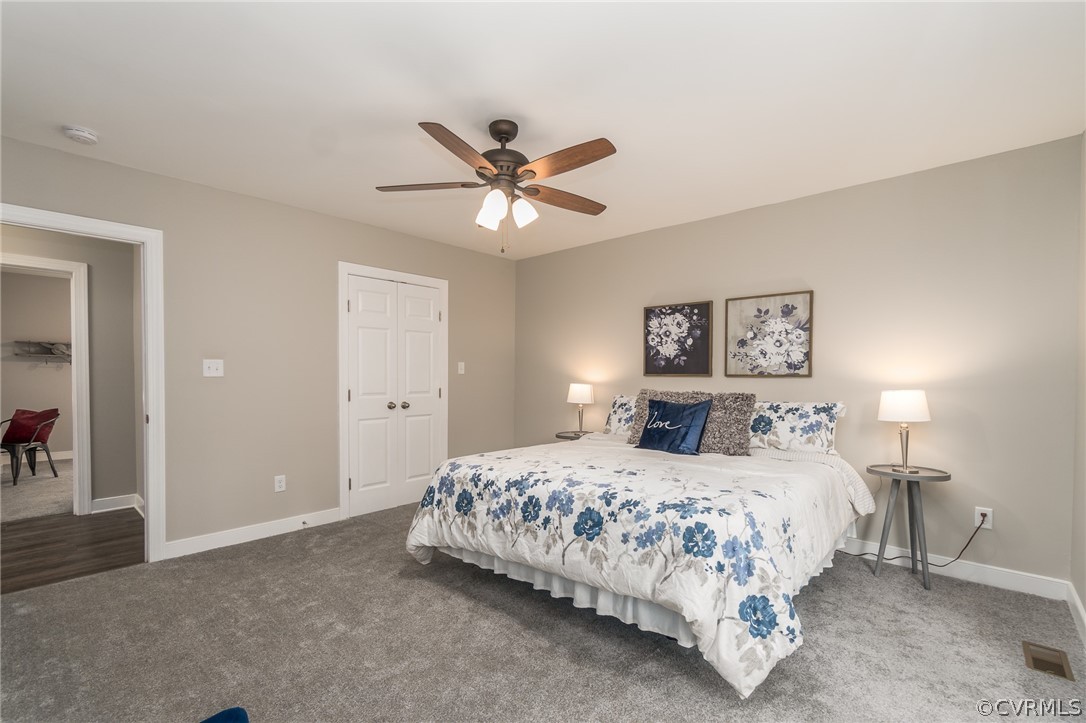 706 Hampton Road Petersburg, VA 23805 - Photo 12 of 26 WALK IN CLOSET- NEW PAINT,CARPET, LIGHT/FAN FIXTUR