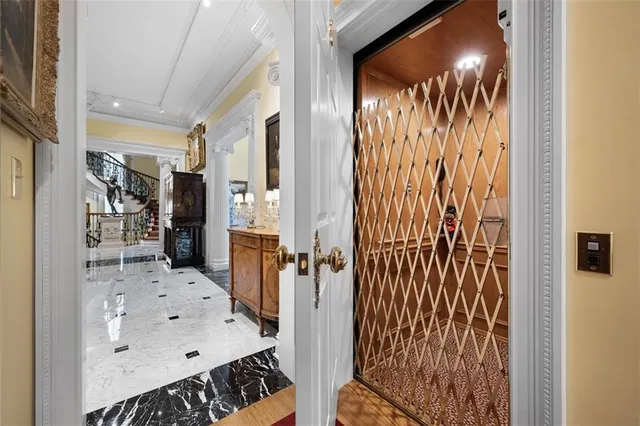 a view of livingroom with furniture and stairs
