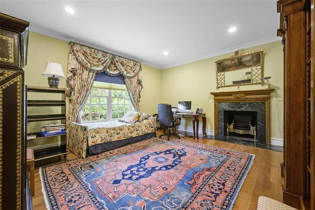 a living room with a couch and a fireplace