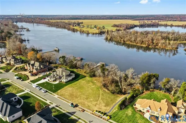 an aerial view of residential building and lake view