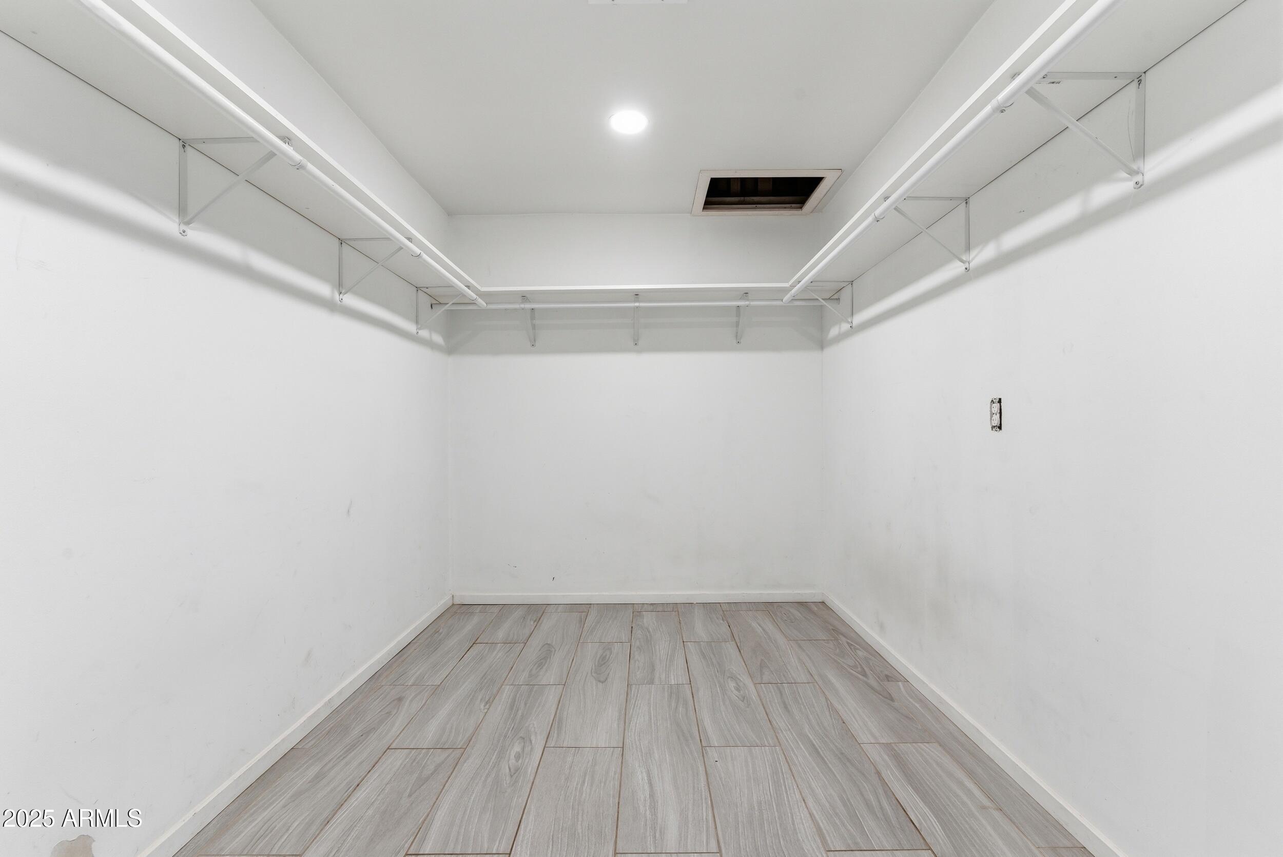 7150 West Montecito Avenue Phoenix, AZ 85033 - Photo 13 of 30 a view of a room with wooden floor